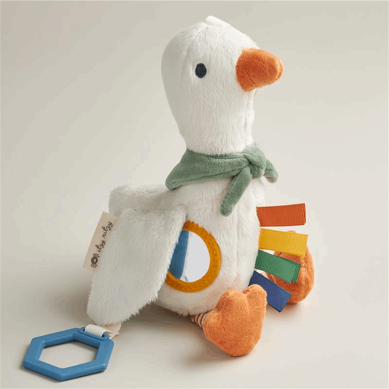 Itzy Ritzy Bitzy Traveler plush goose with green scarf and multicolor ribbons