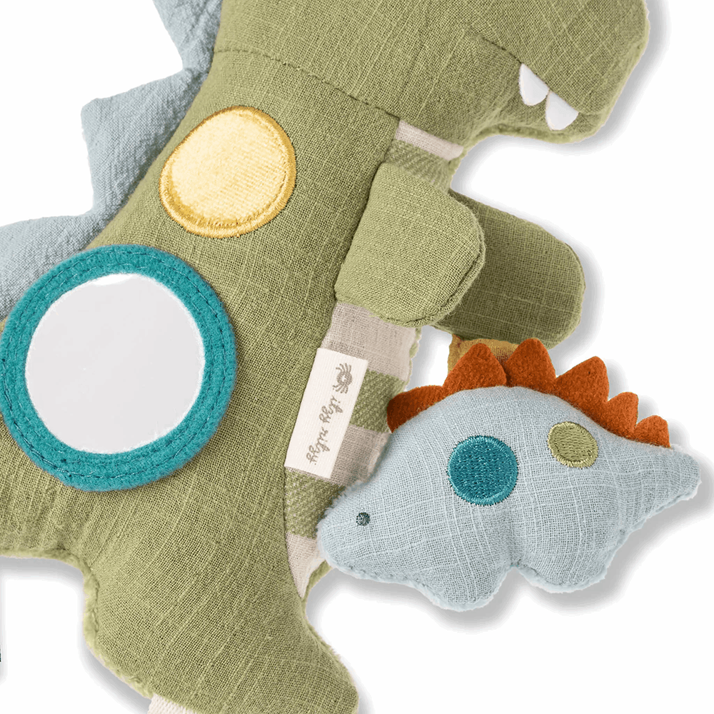 Itzy Ritzy Bitzy Traveler plush dinosaur and cloud toy set; green dinosaur with teal circle and orange spikes (2 pieces)