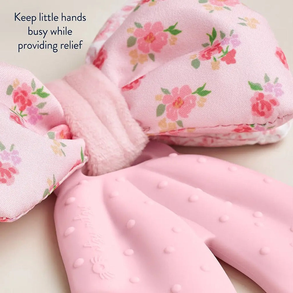 Itzy Ritzy Bow Sweetie Crinkle teething toy, pink floral bow fabric with soft pink crinkle silicone.