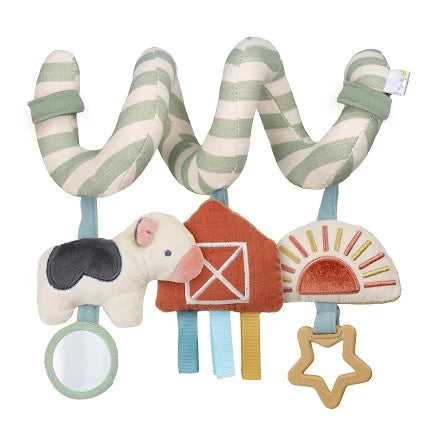 Itzy Ritzy Itzy Bitzy spiral car seat toy with pastel striped arms and cow, barn, sun, star charms