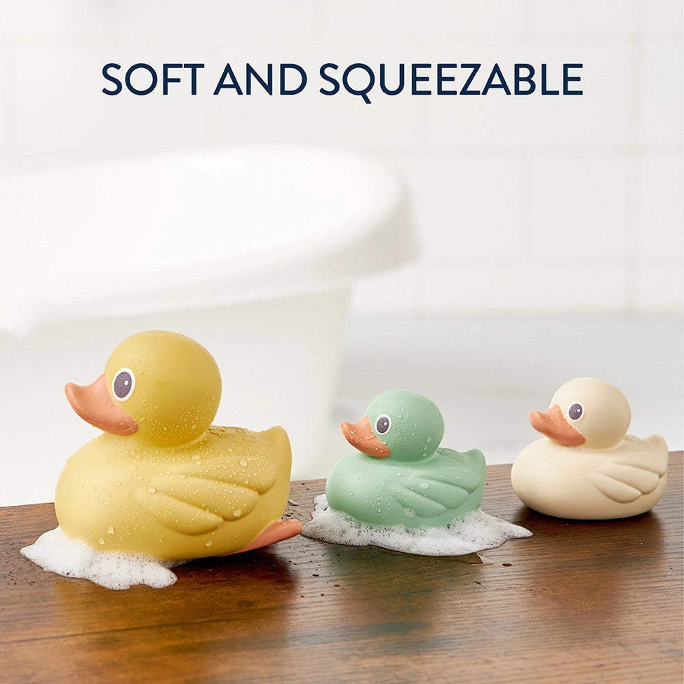 ITZY RITZY Itzy Ducky Family bath toys: 3 rubber ducks in yellow, mint, cream with bubbles