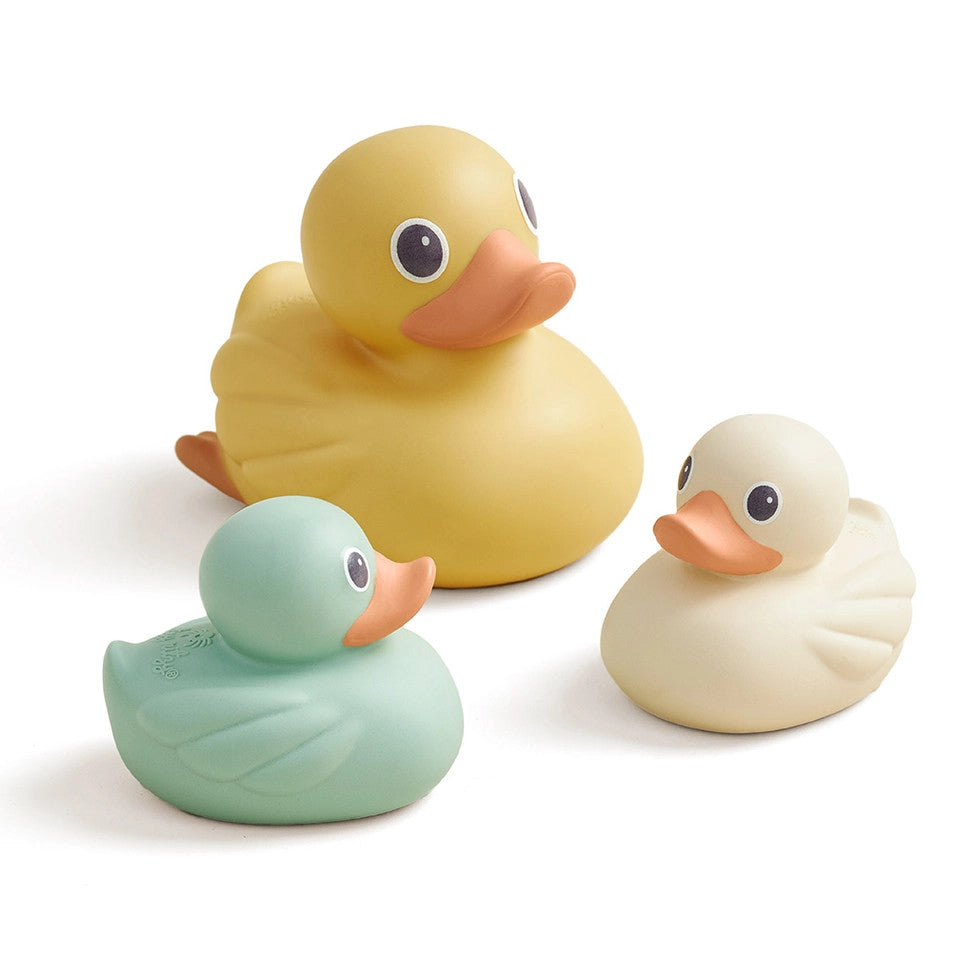 Itzy Ritzy Ducky Family bath toys — three rubber ducks in yellow, mint, and cream