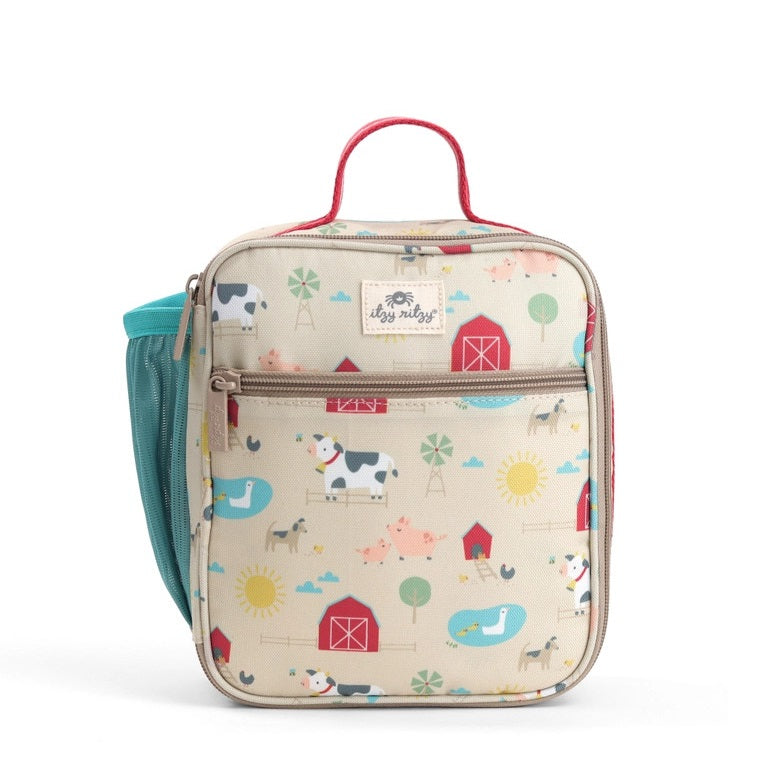 Itzy Ritzy Itzy Lunch Box Bag in beige farm print with red handle and teal side pocket, front zip pocket shown