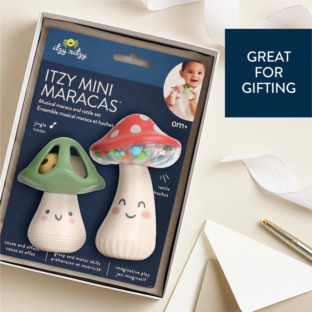 Itzy Ritzy Itzy Mini Maracas, 2-piece plastic mushroom maracas with smiling faces (green and red caps)