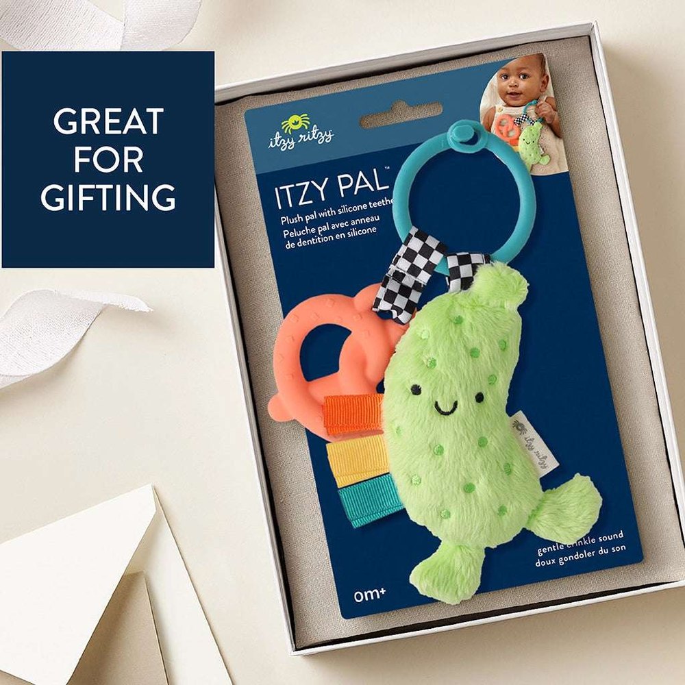 Itzy Ritzy Itzy Pal Parker the Pickle teething plush toy in bright lime green with colorful rings