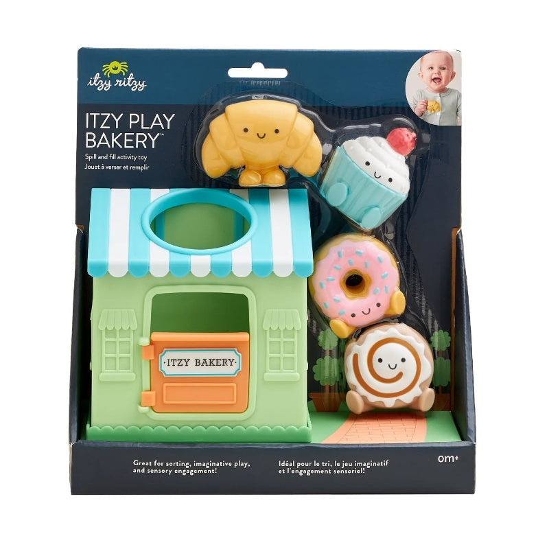 Itzy Ritzy Itzy Play Bakery spill-and-fill activity toy set with pastel storefront and four pastry figures