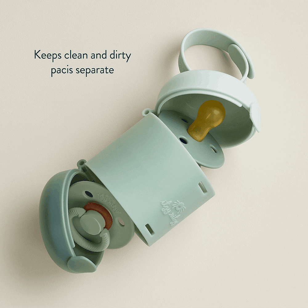 Itzy Ritzy Itzy Pod Duo pacifier case in mint green with yellow nipple; keeps clean and dirty pacis separate