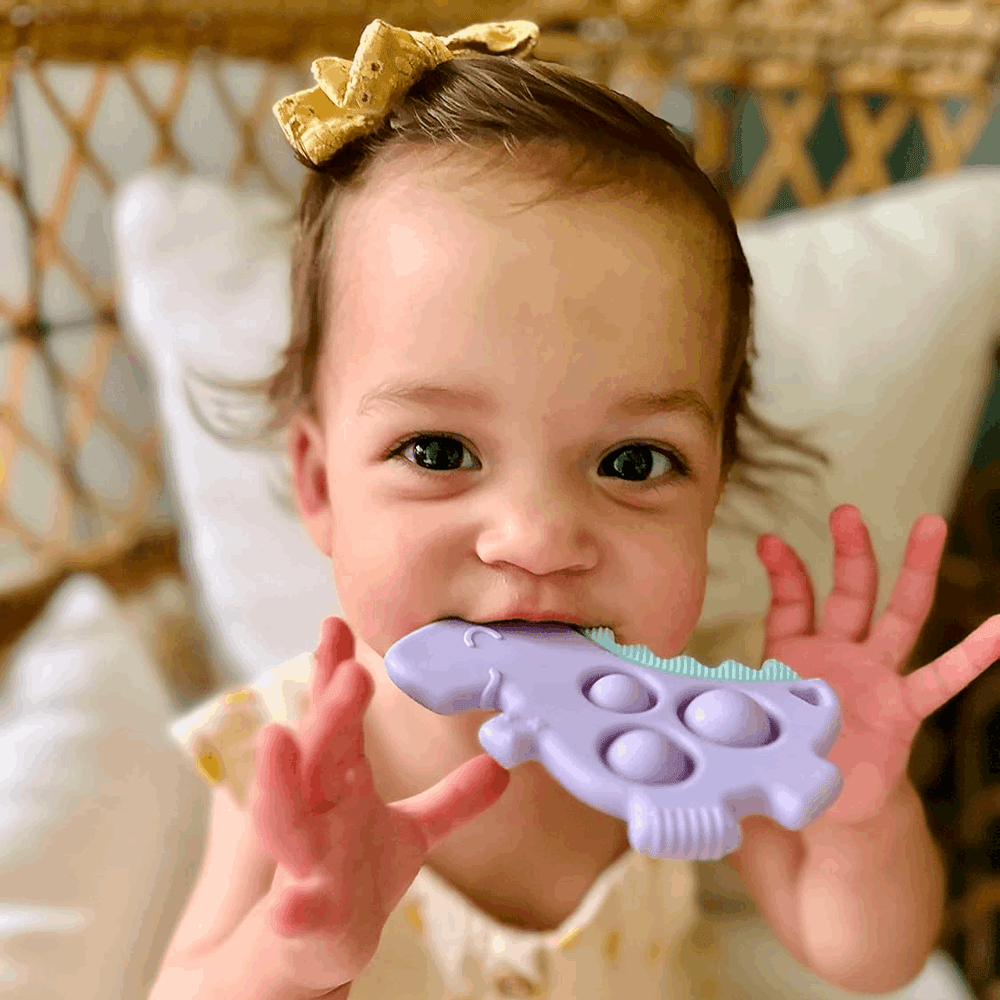 Itzy Ritzy Itzy Pop silicone teether for babies, lilac purple with bubble-shaped bumps