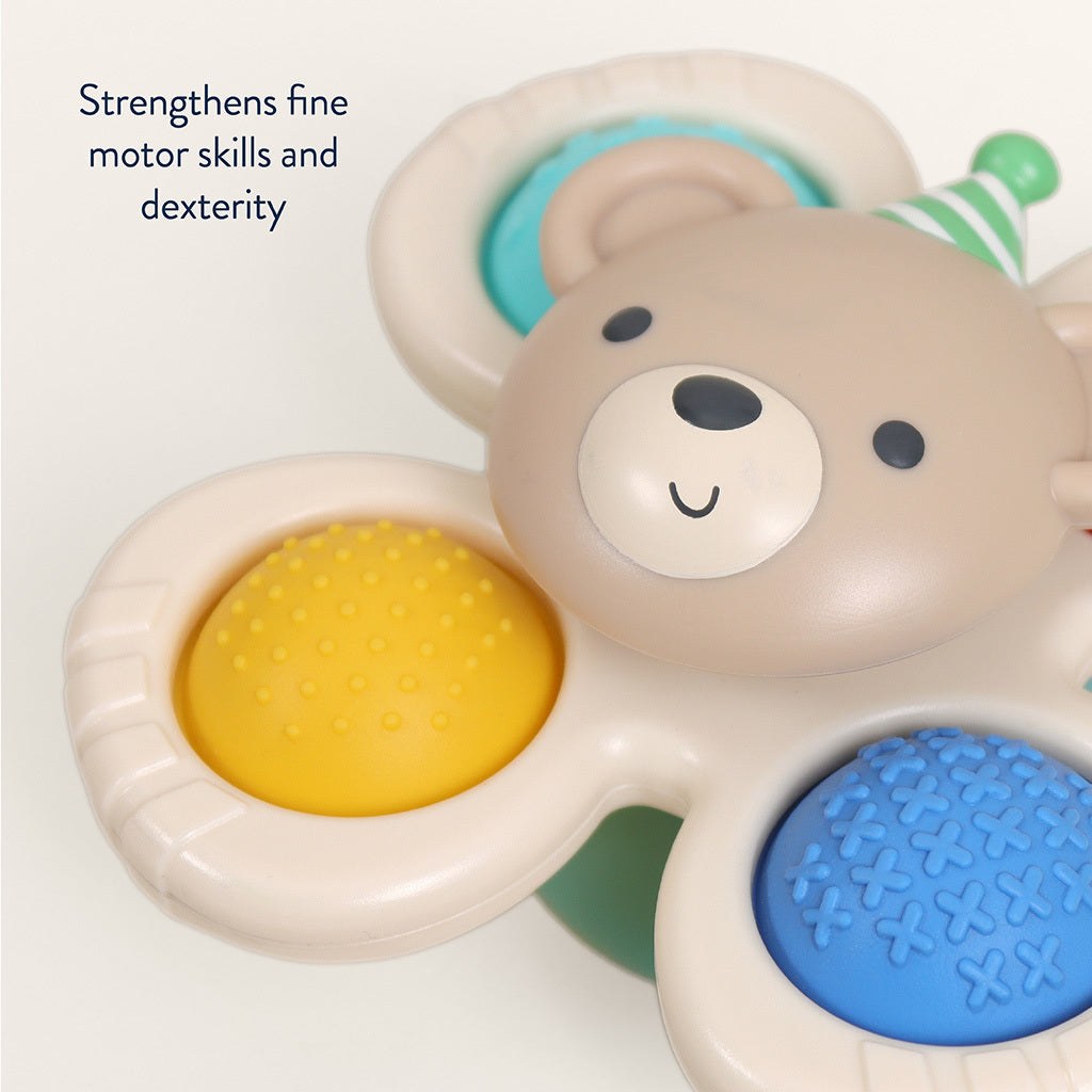 Close-up of the Circus bear centre with yellow and blue textured silicone poppers