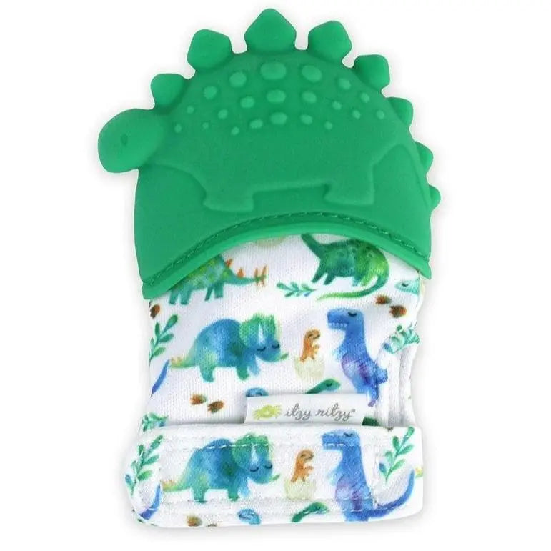 Itzy Ritzy Itzy Silicone Teething Mitts with dinosaur-print fabric and a bright green dinosaur cap worn on the hand.