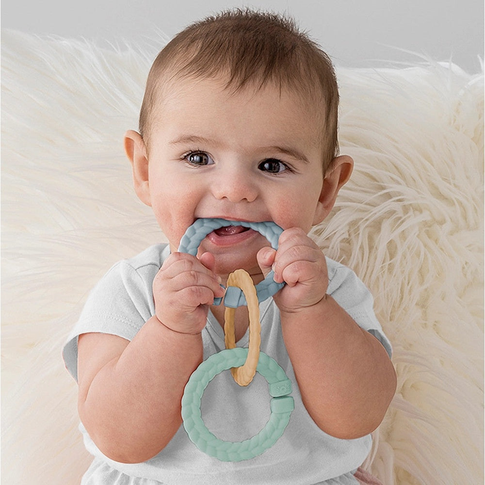 Itzy Ritzy Teether Gift Set featuring blue and mint silicone rings for babies 2-pack