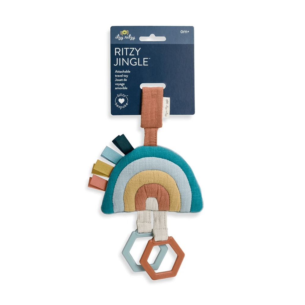 Itzy Ritzy Jingle Attachable Travel Toy rainbow teether with teal arch, pastel arches, and hex rings