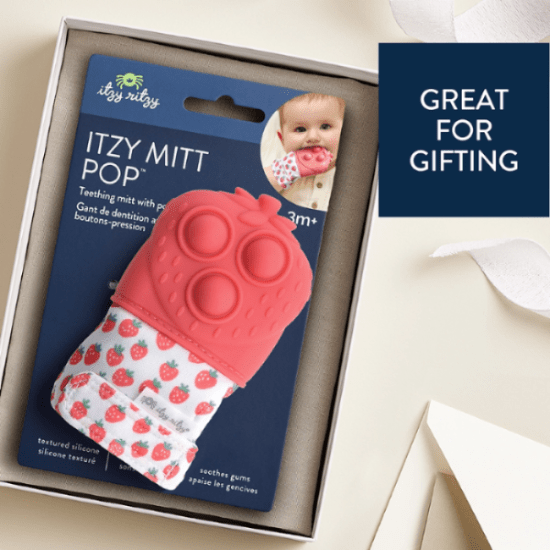 Itzy Ritzy Mitt Pop teething toy: pink silicone mitt with strawberry-pattern sleeve, packaged for gifting.
