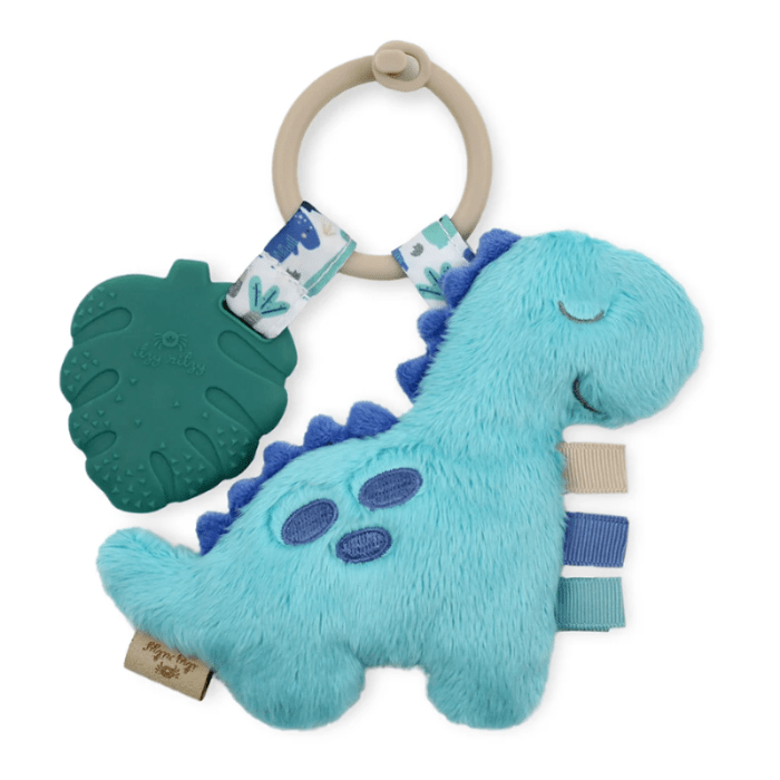 Itzy Ritzy Pal plush and teether dinosaur toy, blue plush with teal spikes and leaf-shaped teething ring