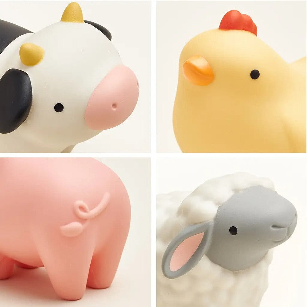 Itzy Ritzy Play Barn Spill and Fill Activity Toy, soft farm animals for baby play demonstrating spill-and-fill design.