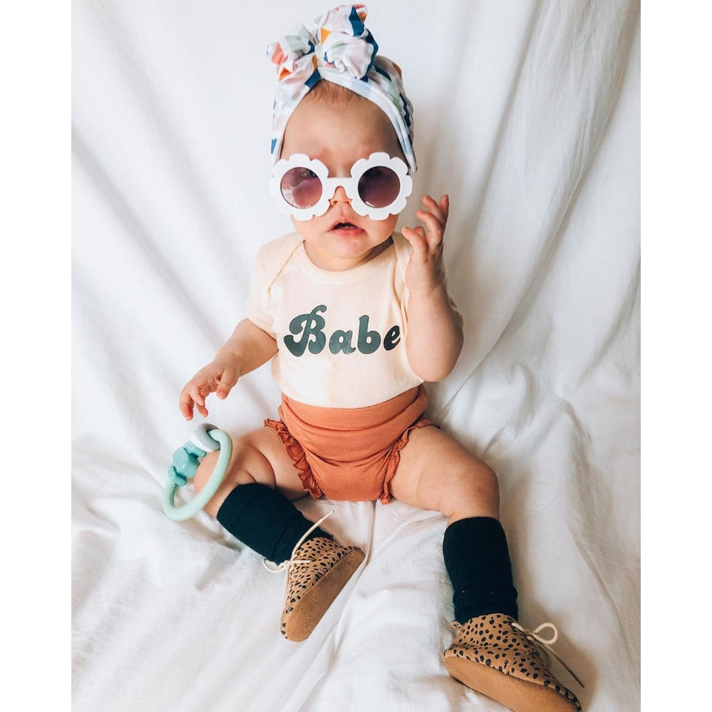 Itzy Ritzy silicone teether rattle with mint green ring for babies