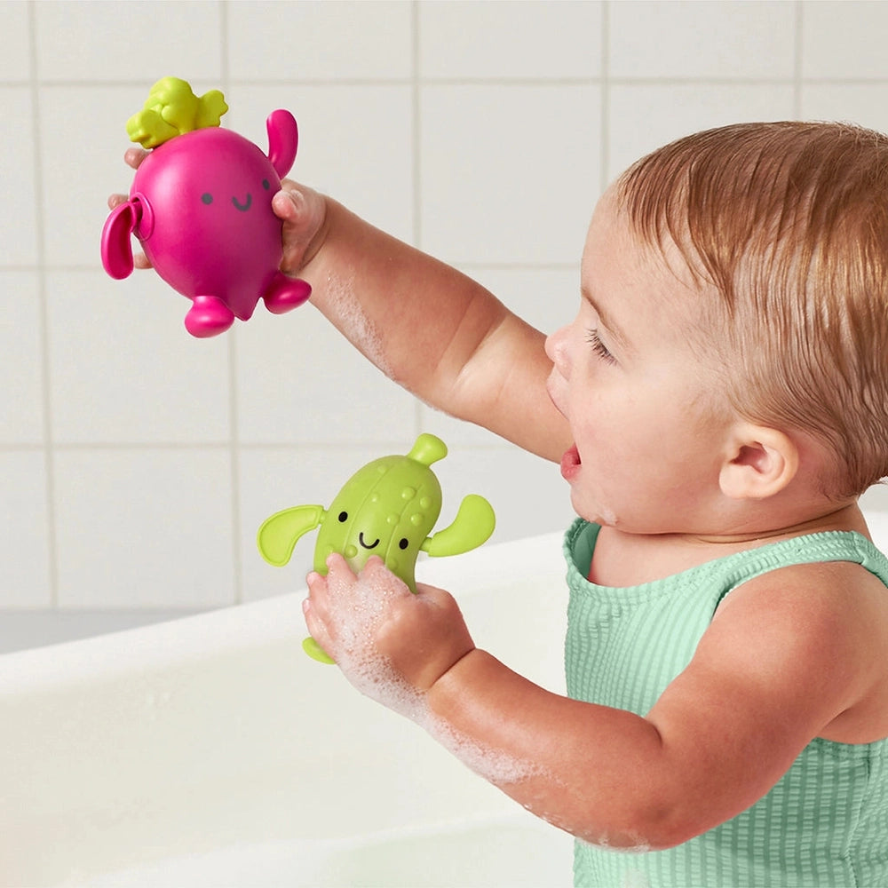 Itzy Ritzy Silly Swimmers Pickle and Beet bath toys set, pink and green characters, 2 pieces