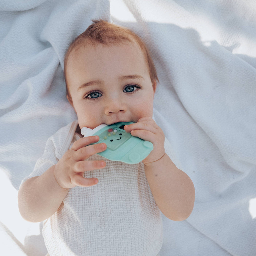 Itzy Ritzy Sweetie Shake Plus Rattle Teether in mint teal for babies