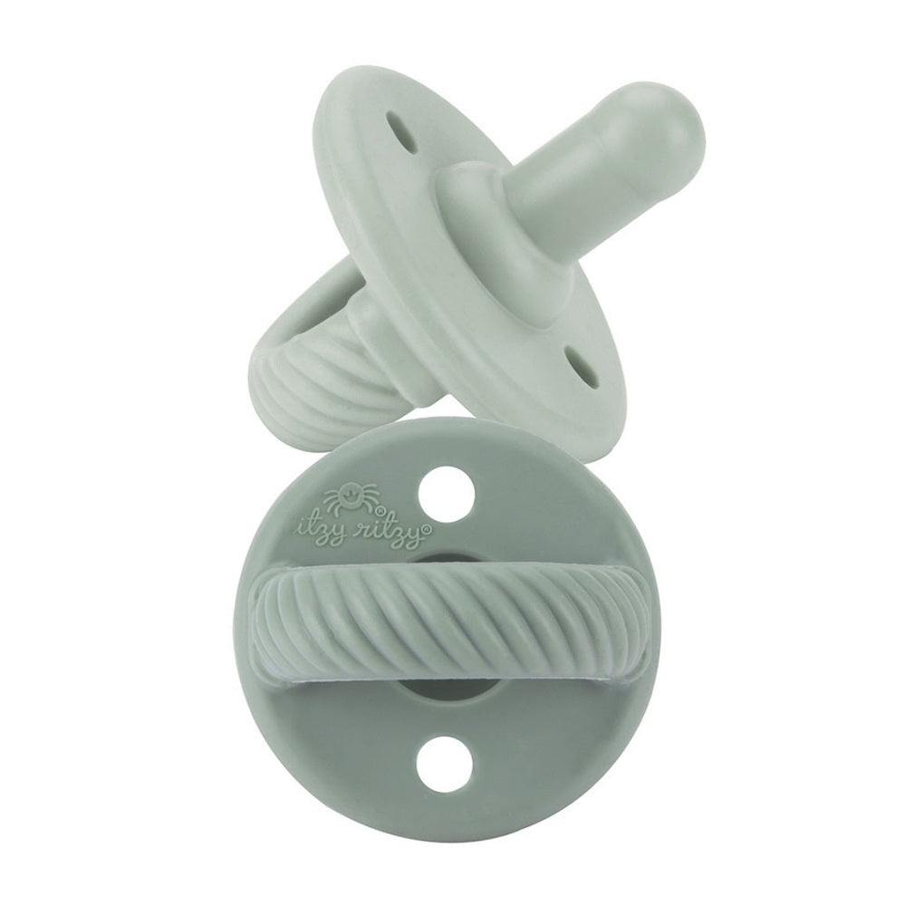 Itzy Ritzy Sweetie Soother Pacifier Sets 2 Pack (6-18M) mint green; two pacifiers with clip strap.
