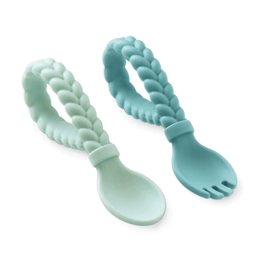 Itzy Ritzy Sweetie Spoon & Fork Set with pastel braided silicone handles, two spoons laid ready for feeding.