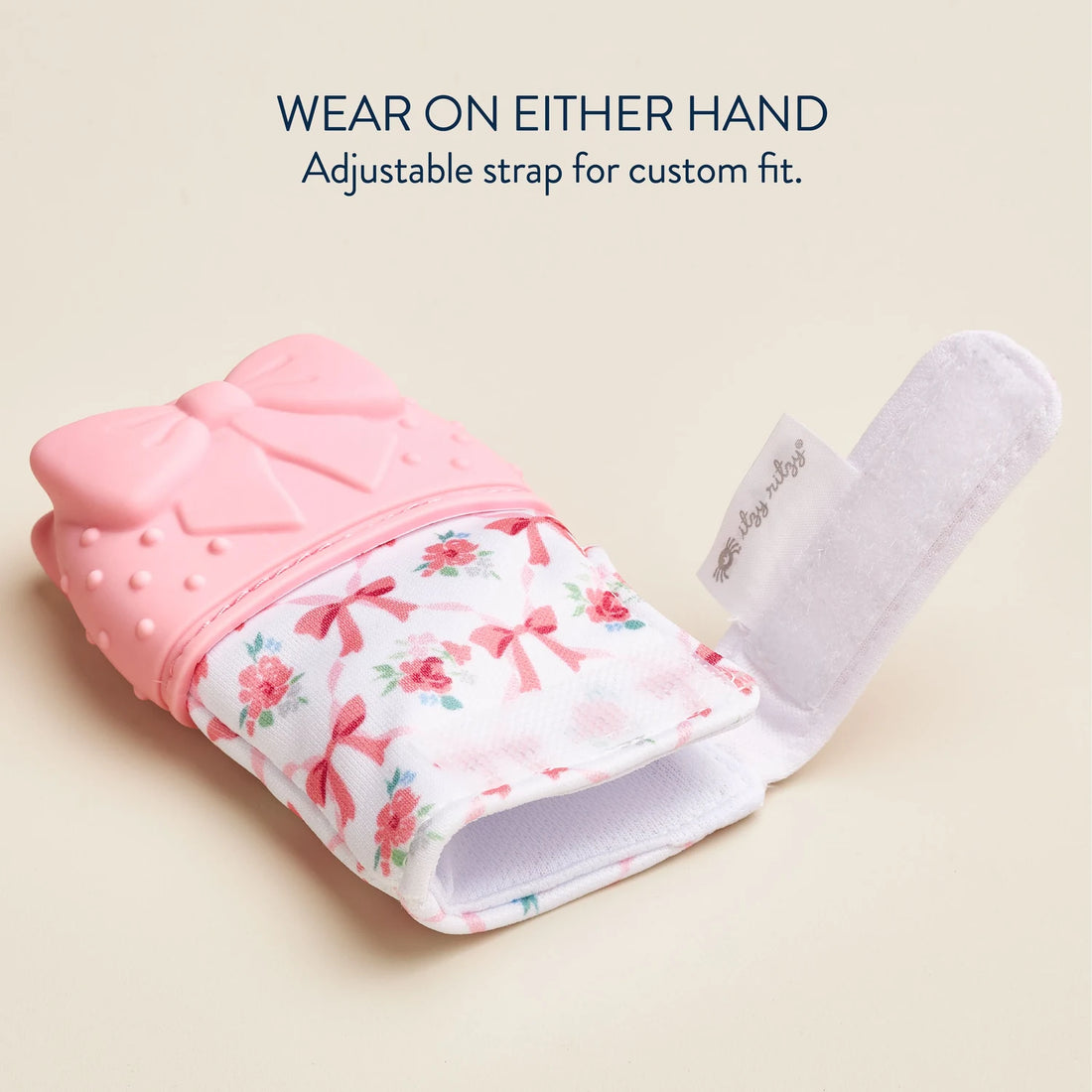 Itzy Ritzy Itzy Mitt Bow with adjustable strap open