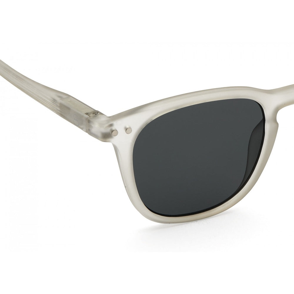 IZIPIZI Sun Junior Defty Grey sunglasses with translucent cream frame and dark lenses