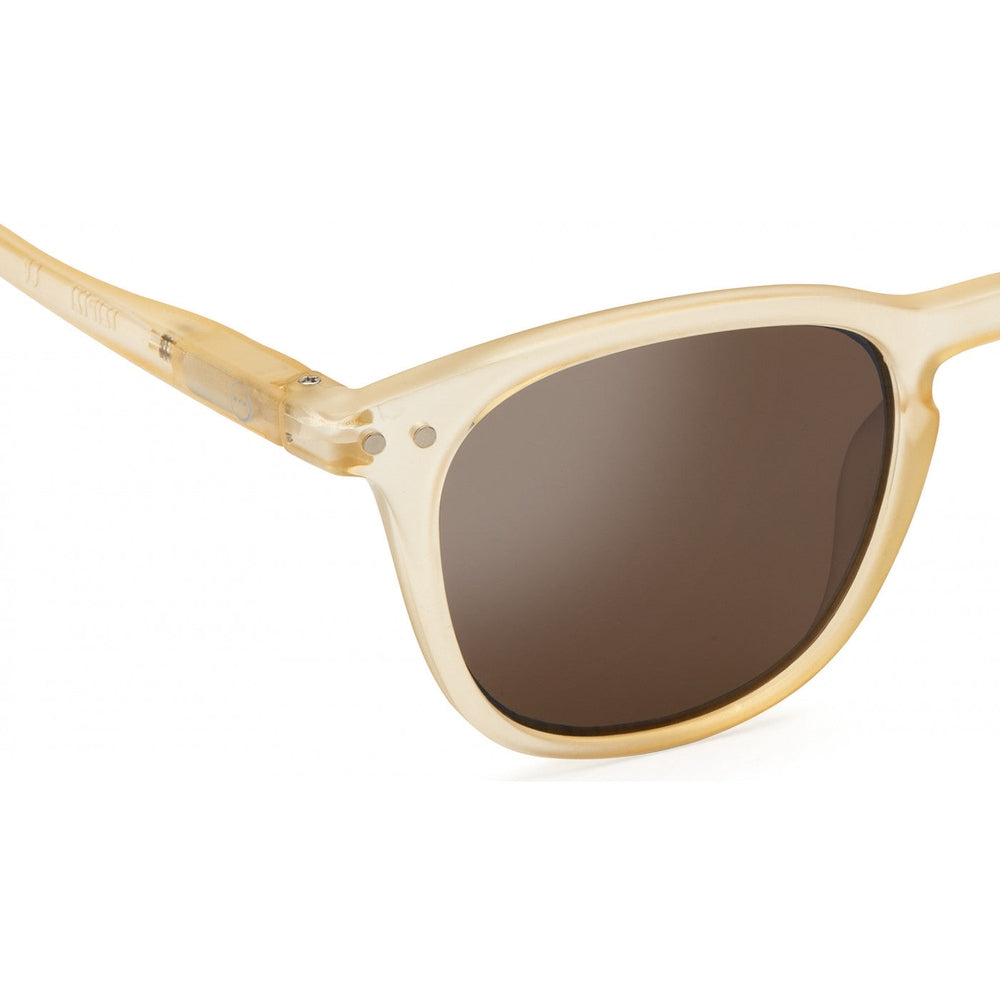 IZIPIZI Sun Junior Fool's Gold sunglasses in a translucent yellow frame with brown lenses