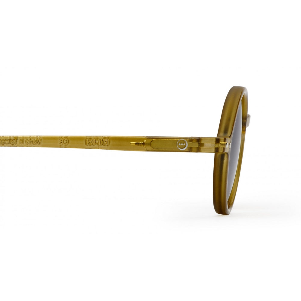 IZIPIZI Sun Junior Bottle Green sunglasses, translucent frame shows vintage amber tone