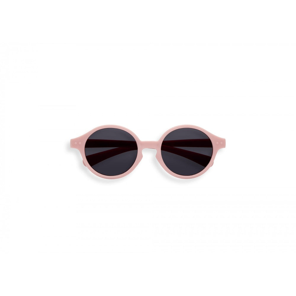 IZIPIZI Kids pastel pink sunglasses with round frames and dark lenses