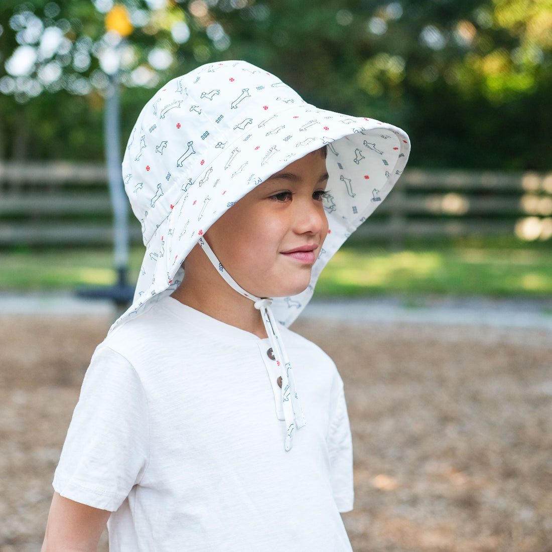 Jan & Jul Cotton Xplorer Hat - Dachshund child wearing three-quarter side view