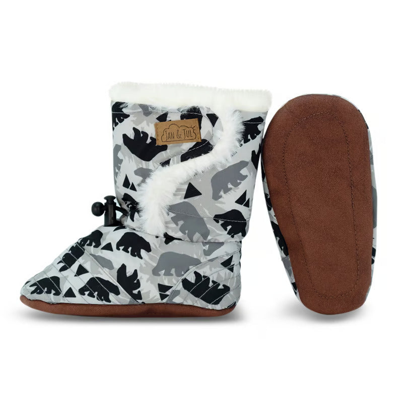 Jan & Jul Baby Stay-Put Winter Booties Bear in gray bear print with white faux fur trim and brown sole, adjustable toggle securing fit.