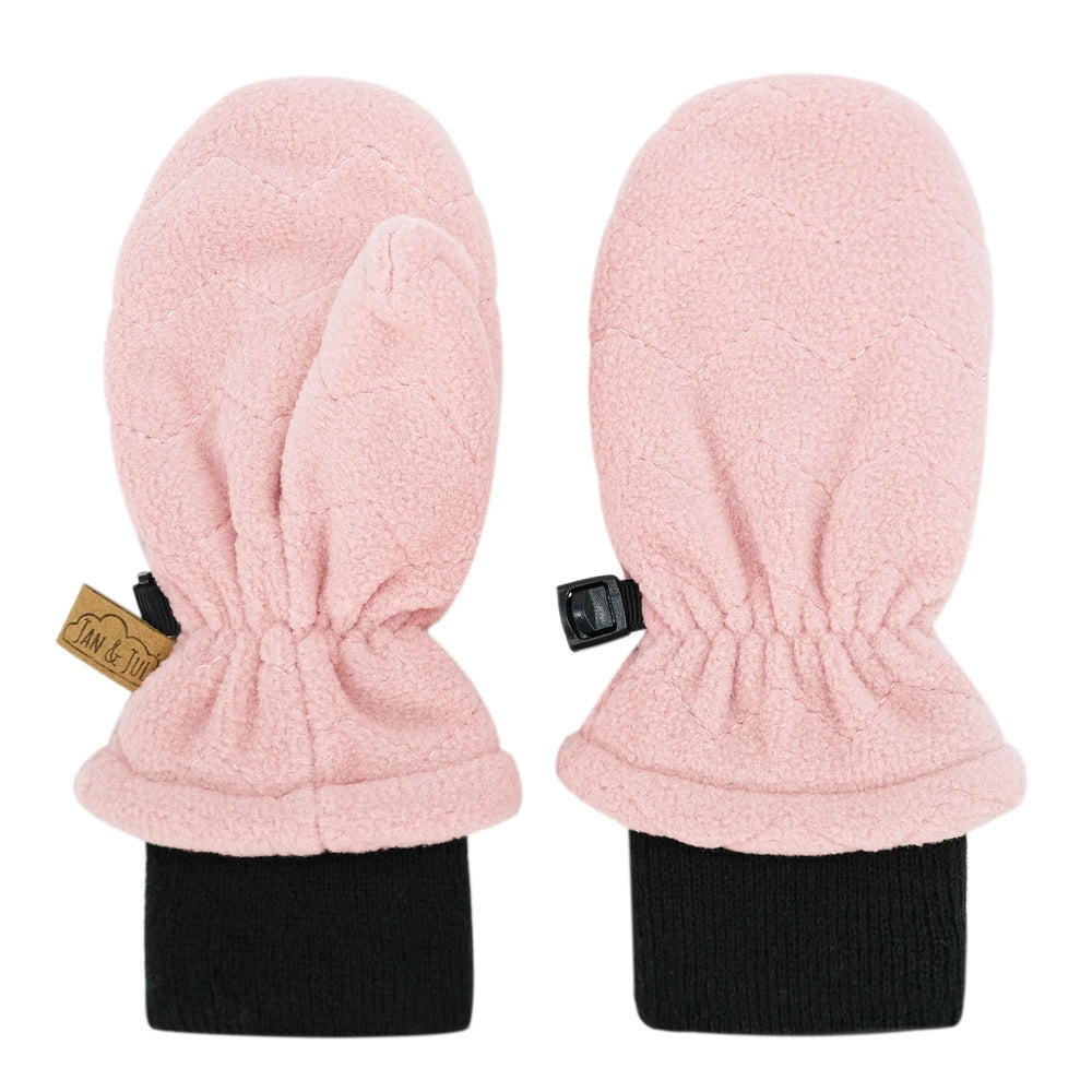 Jan & Jul Fleece Mittens Dusty Pink with black ribbed cuffs, laid flat to show soft fleece.