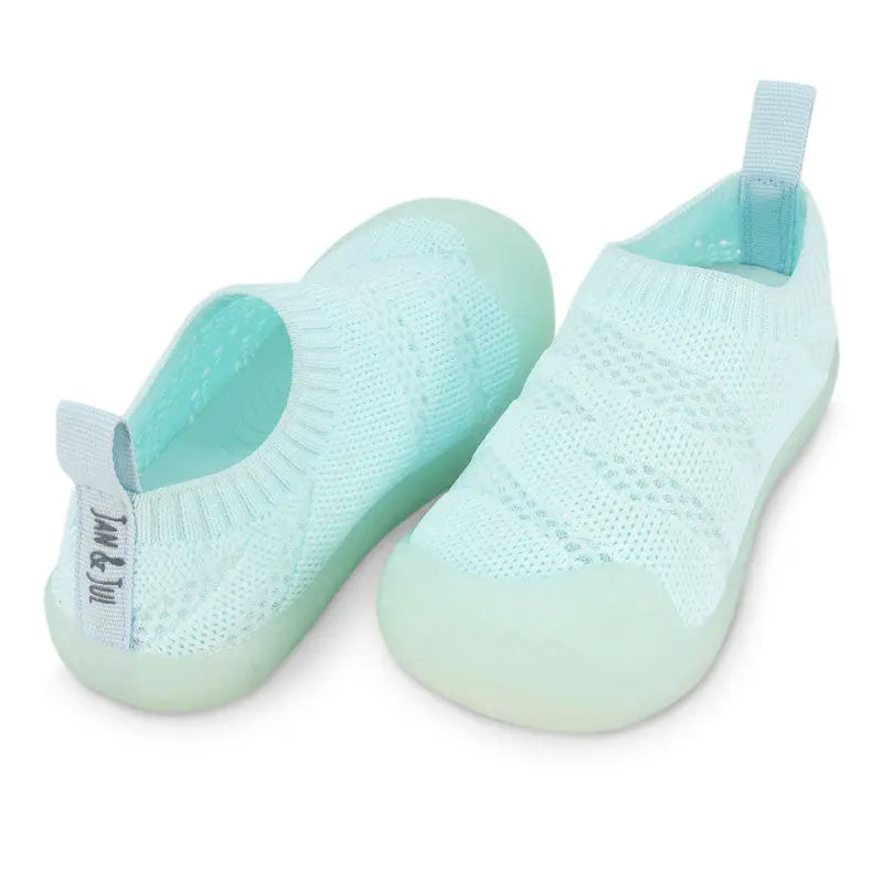 JAN & JUL Jelly Jumper Flow Shoes Mint pair of baby knit slip-ons with mint jelly soles.