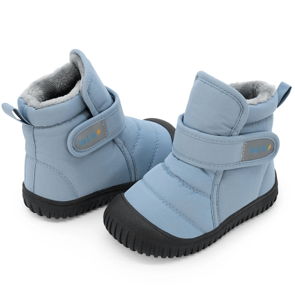 Jan & Jul Kids Insulated Ankle Boots Dusty Blue with faux fur lining and Velcro strap fastened.