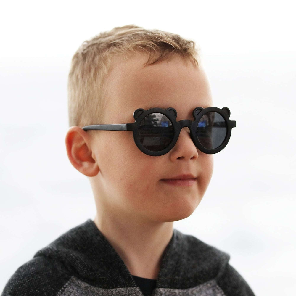 Jan & Jul Kids Polarized Bear Sunglasses Black with bear-shaped frames worn by child