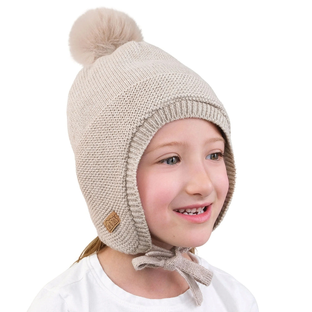 JAN & JUL kids pom-pom knit hat in wheat beige with ear flaps and tied chin strap