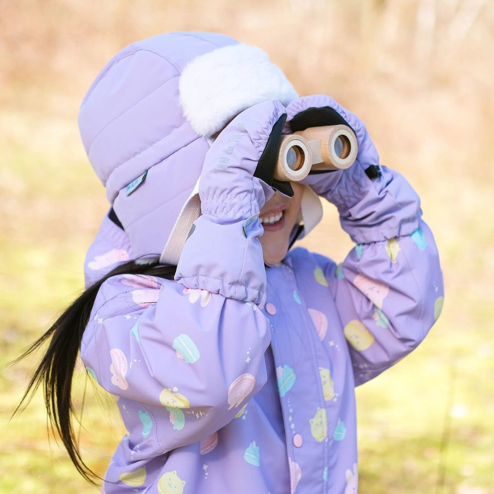 Jan & Jul Kids Rain Mittens Lavender on a child in lavender coat looking through binoculars, showing warm waterproof mittens.