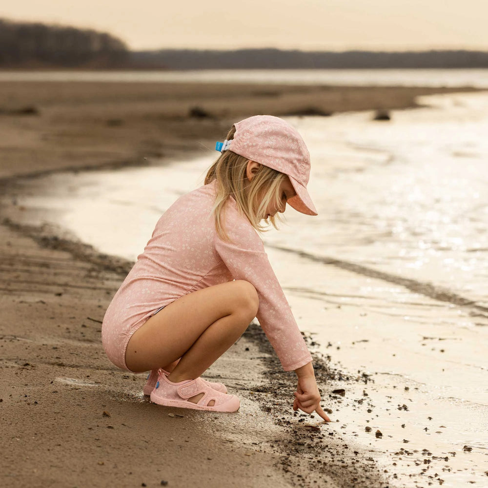 JAN & JUL Sunnybreeze Sandals Pink Prairie for kids; pink toddler sandals on a sandy beach