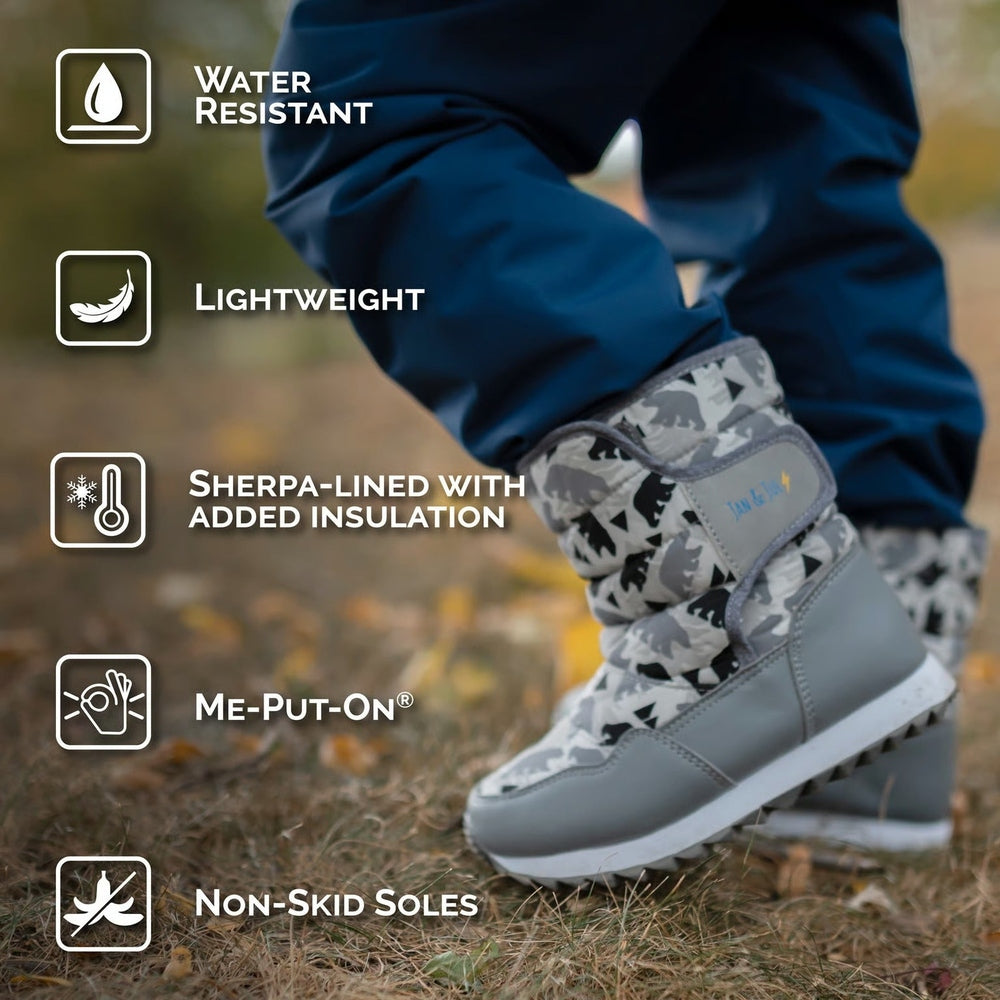 Jan & Jul Kids Tall Puffy Winter Boots Polar Pals worn by a child, featuring sherpa insulation and non-skid, water-resistant soles.