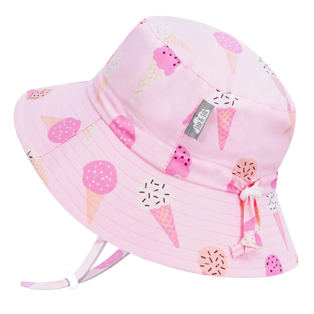 JAN & JUL Kids water-repellent pink ice-cream print bucket hat with bow and chin strap.