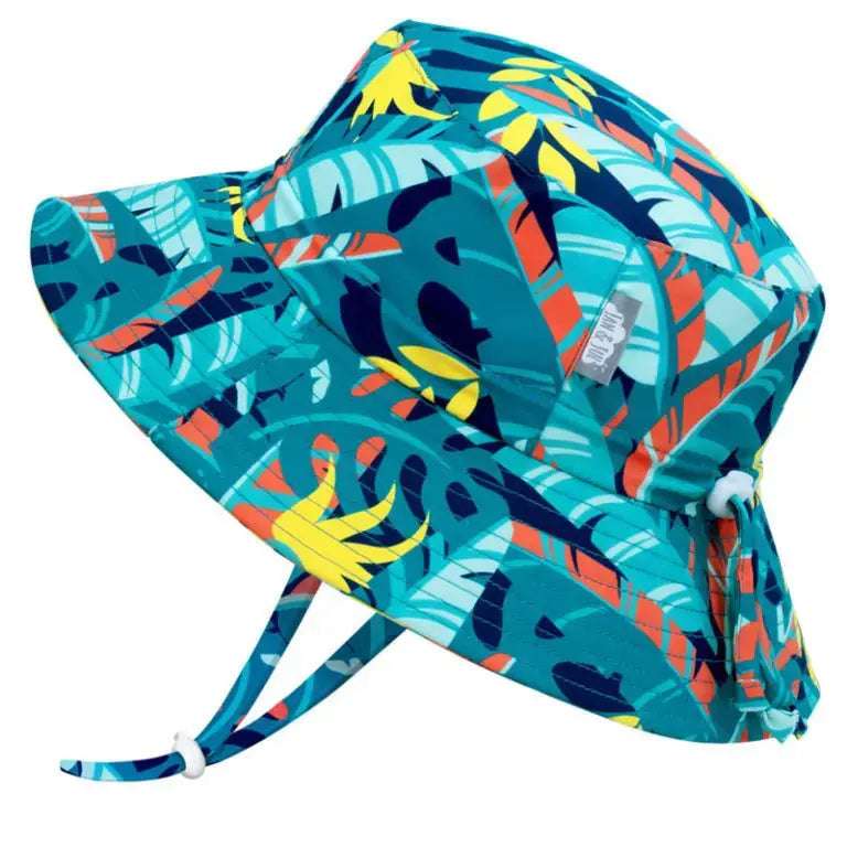 JAN & JUL kids tropical water-repellent bucket hat in teal with bright leaf print