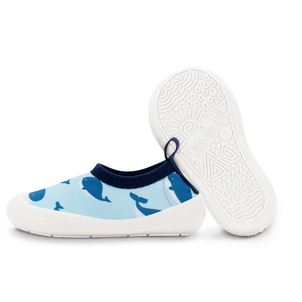 Jan & Jul Kids Water Shoes Blue Whale pattern, navy trim, white grippy sole with back pull loop for easy on.