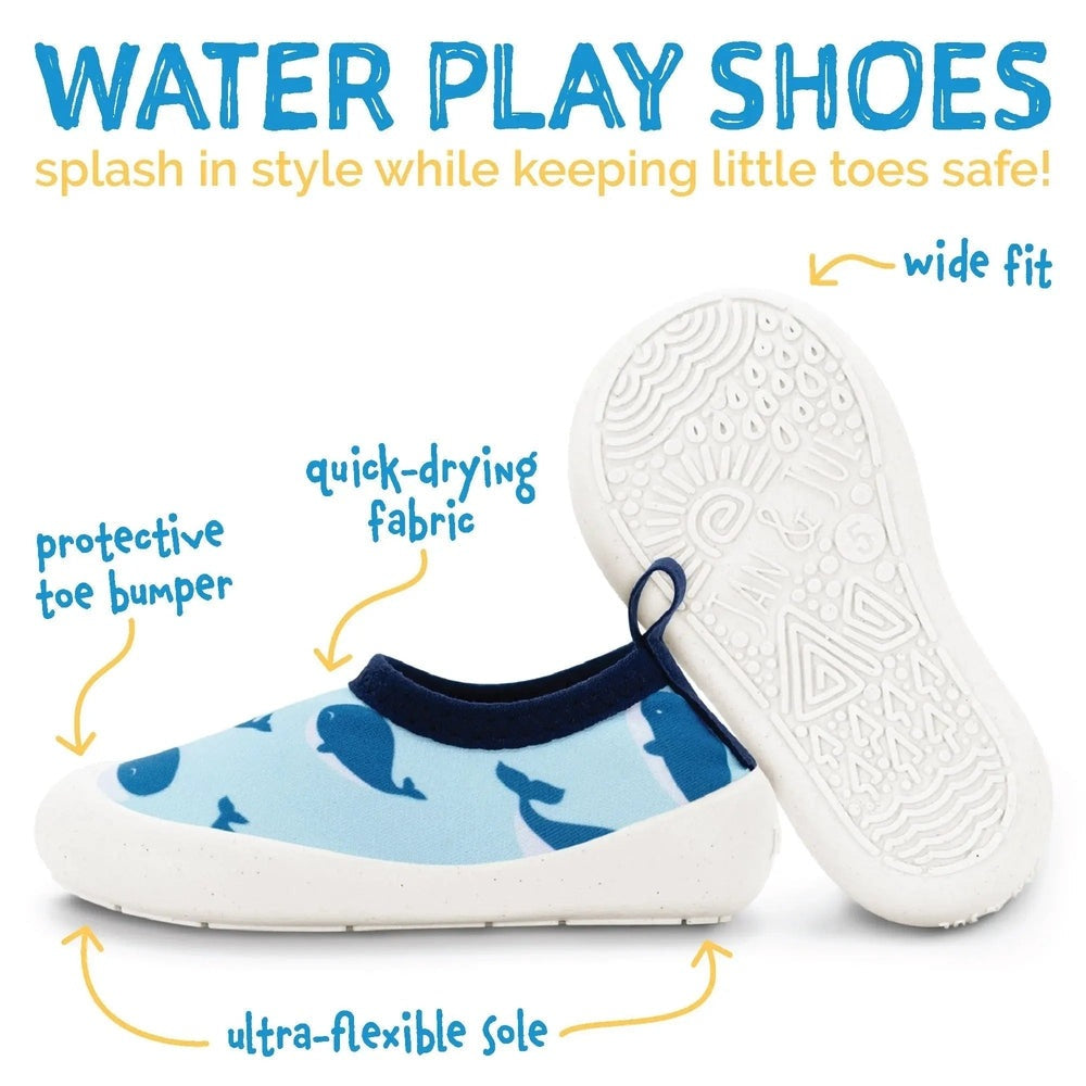 Jan & Jul Kids Water Shoes Dino Buddies on a toddler’s feet; blue dinosaur print, protective toe bumper, quick-dry fabric.