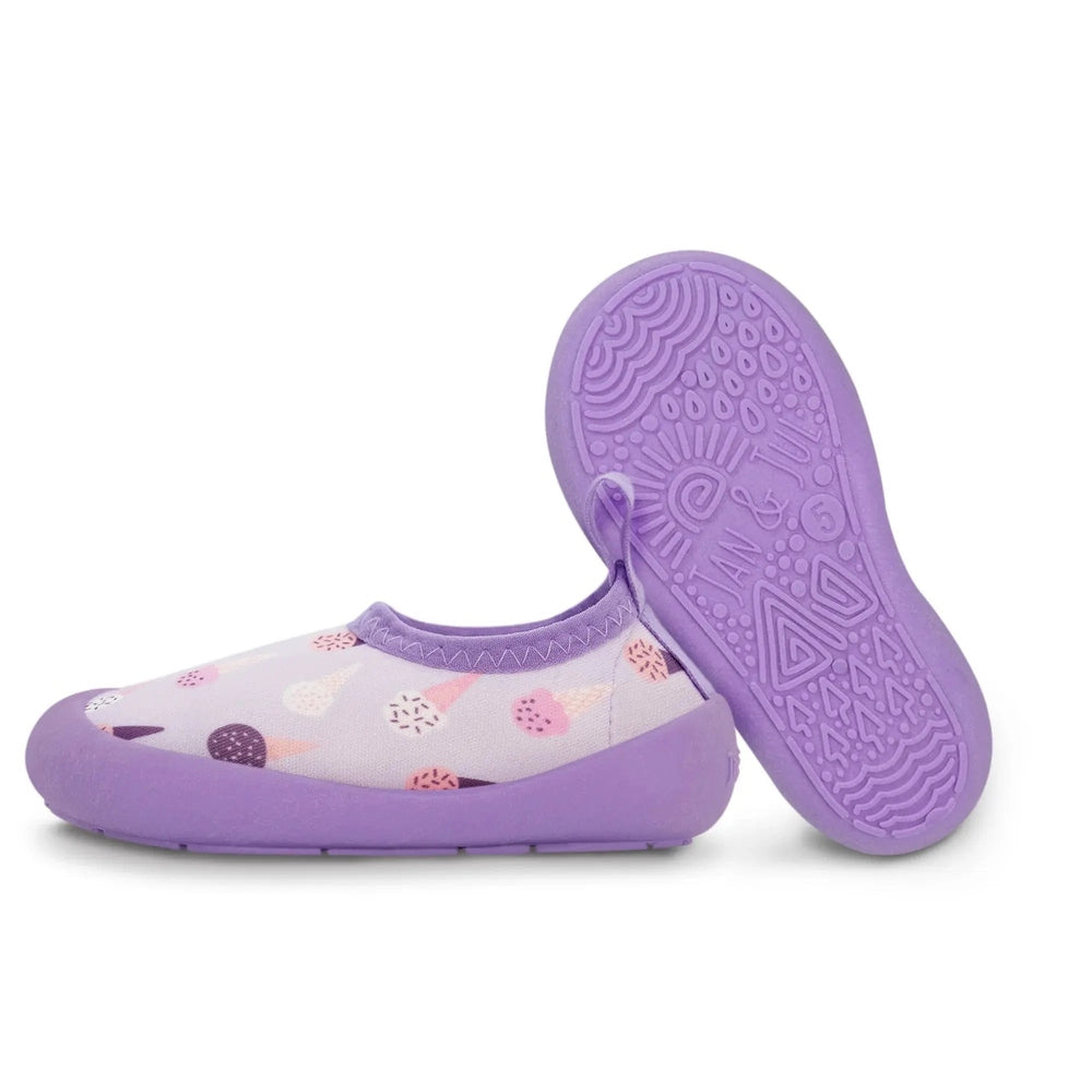 Jan & Jul Kids Water Shoes Lavender Ice Cream; lilac pattern with purple outsole shown on its side to reveal the grippy tread.