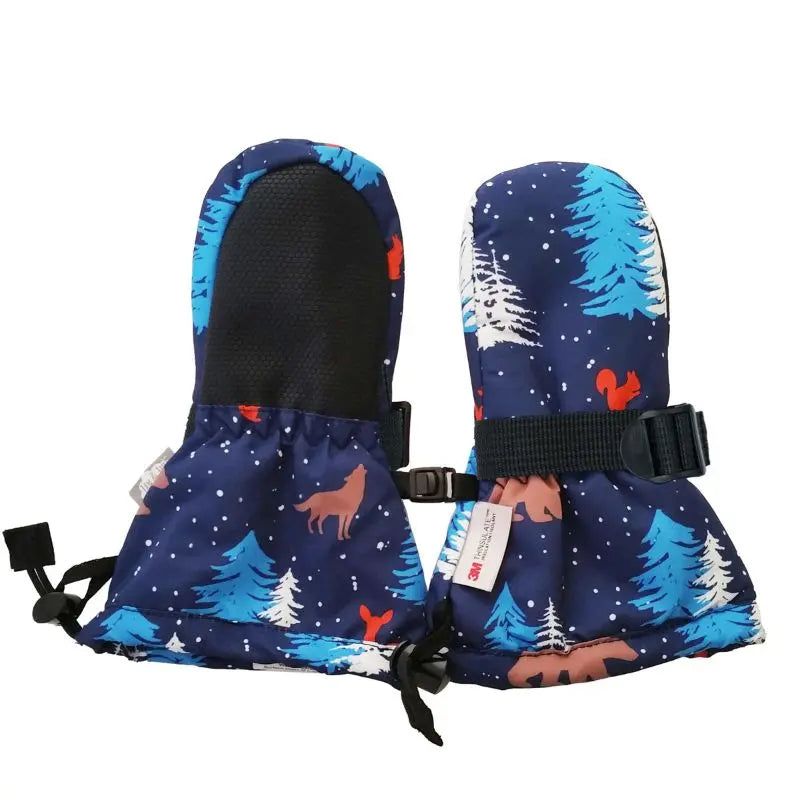 Jan & Jul Kids Waterproof Toasty Dry mitten in woodland blue print; buckled wrist strap and drawstring closure shown.