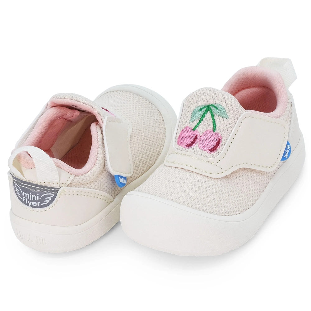 Jan & Jul Mini-Flyer Toddler Sneakers Cherries; pink mesh upper, white sole, cherry embroidery visible.