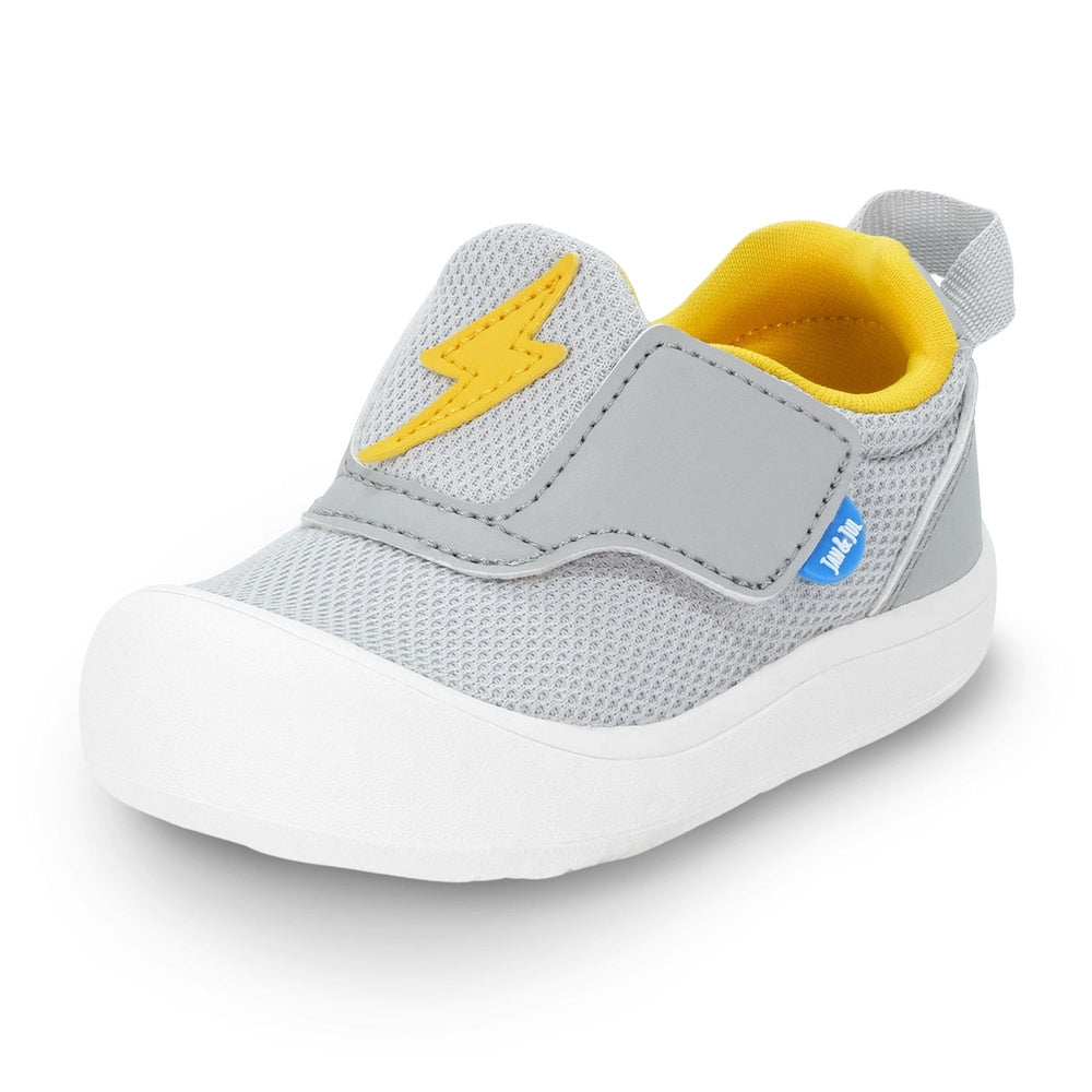 Jan & Jul Mini-Flyer Toddler Sneakers Lightning Bolt, gray mesh with yellow bolt and Velcro strap for easy slip-on use.