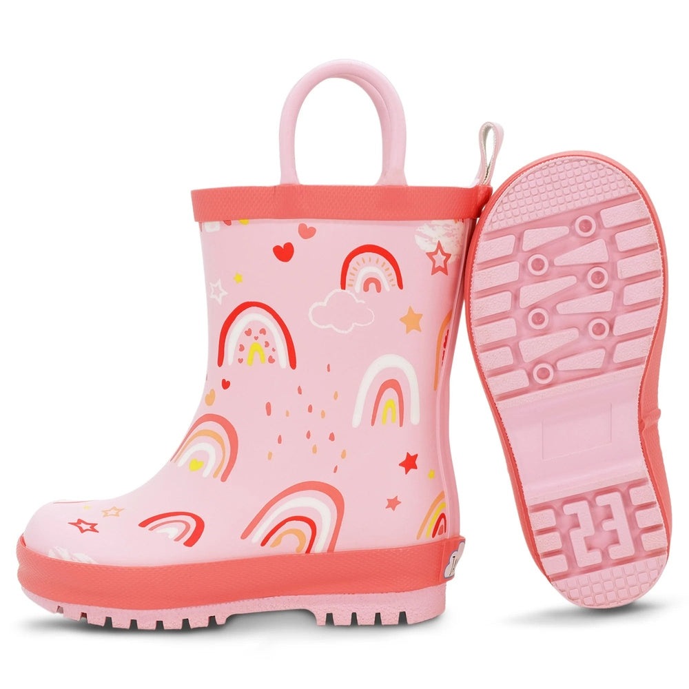 JAN & JUL Puddle Dry Rain Boots Pink Rainbow for toddlers; pink rubber boots with rainbow print and chunky tread, one boot upright.