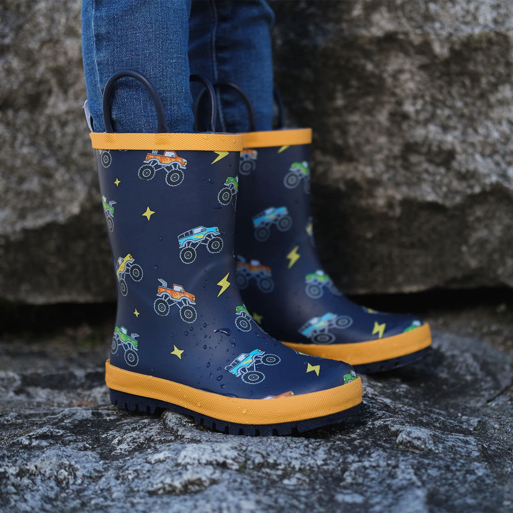 JAN & JUL puddle dry toddler rain boots navy with orange trim, monster-truck print, handles (pair)
