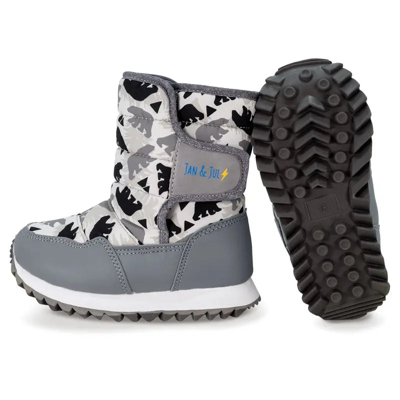 Jan & Jul Toasty Dry Tall Puffy Winter Boots Bear pair; grey upper, bear print, rugged sole visible.